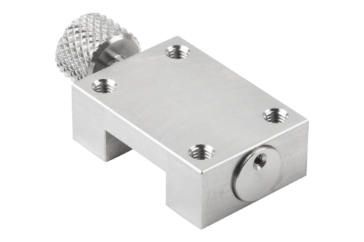 Elemento di bloccaggio per guide lineari profilate miniaturizzate